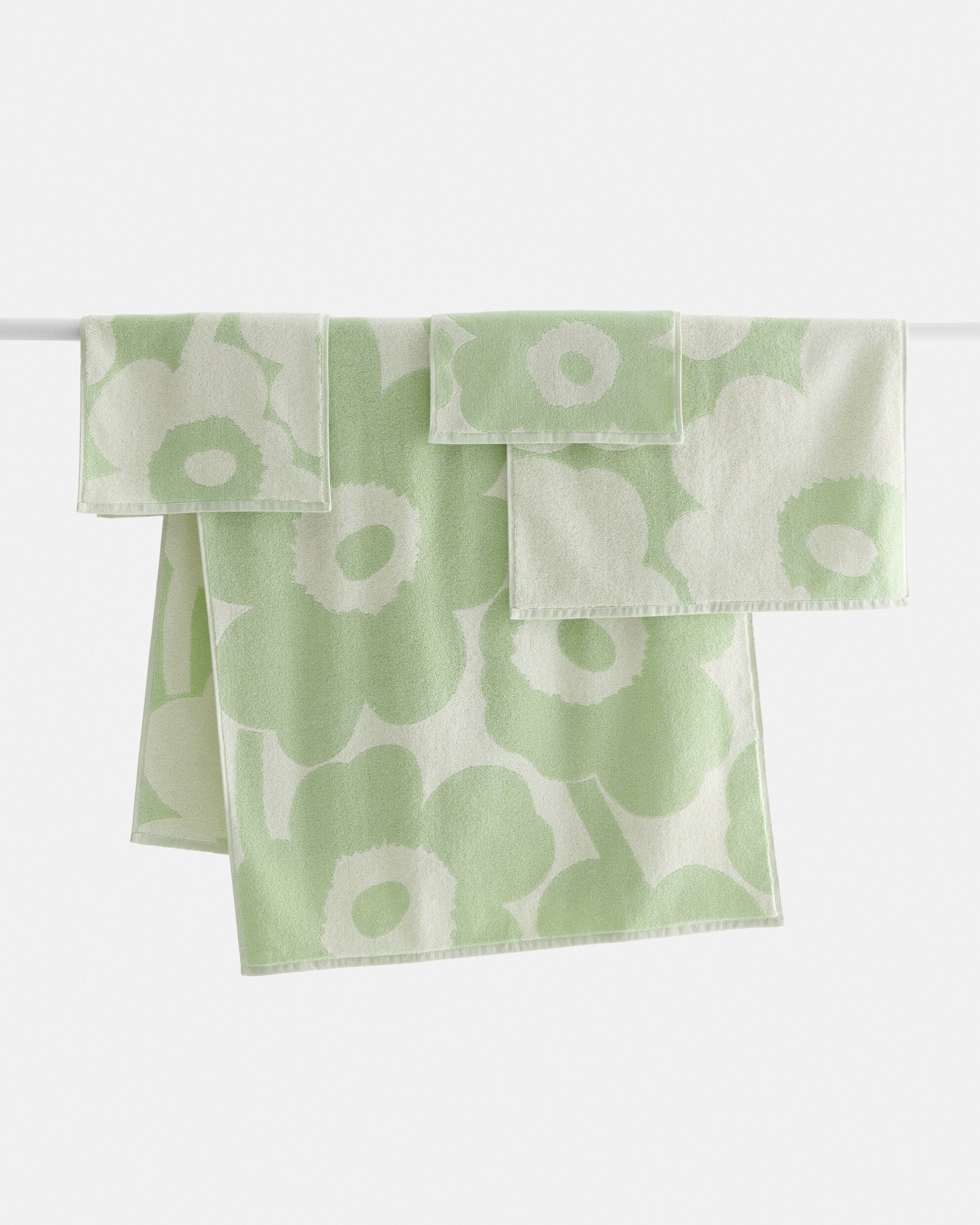 Unikko guest towel 30x50 cm off white sage