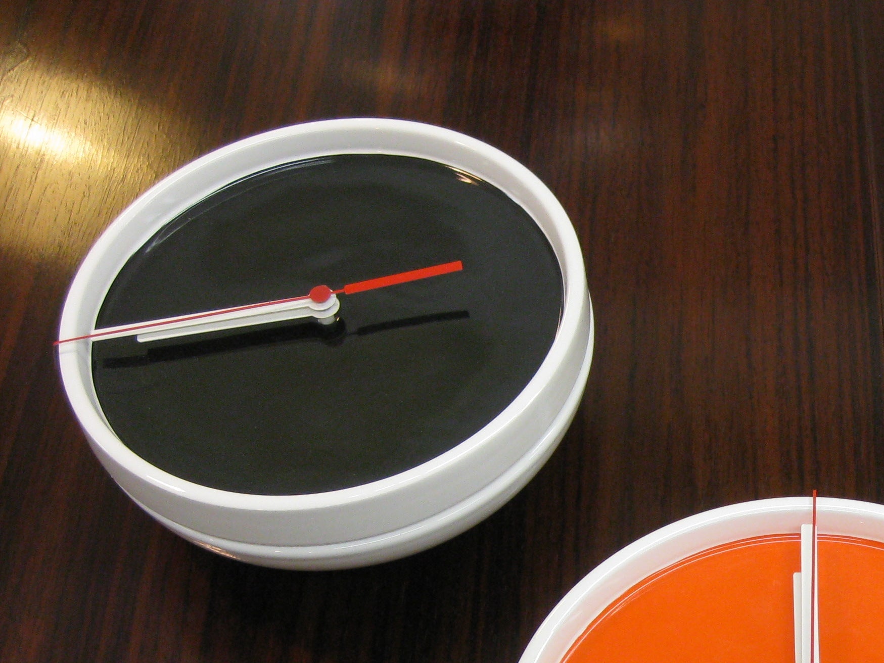 Slice Wall clock white (orange, black or blue)