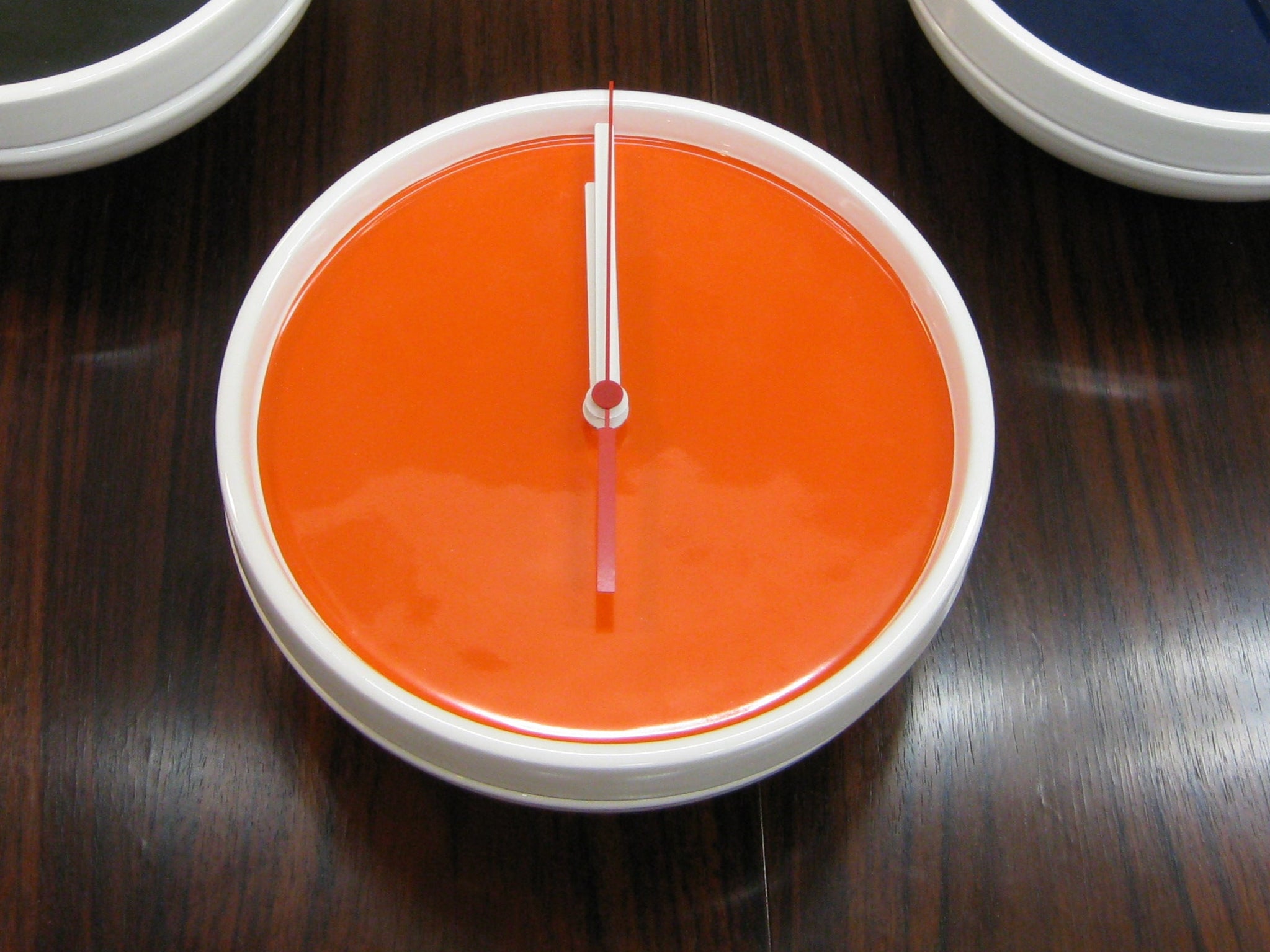 Slice Wall clock white (orange, black or blue)