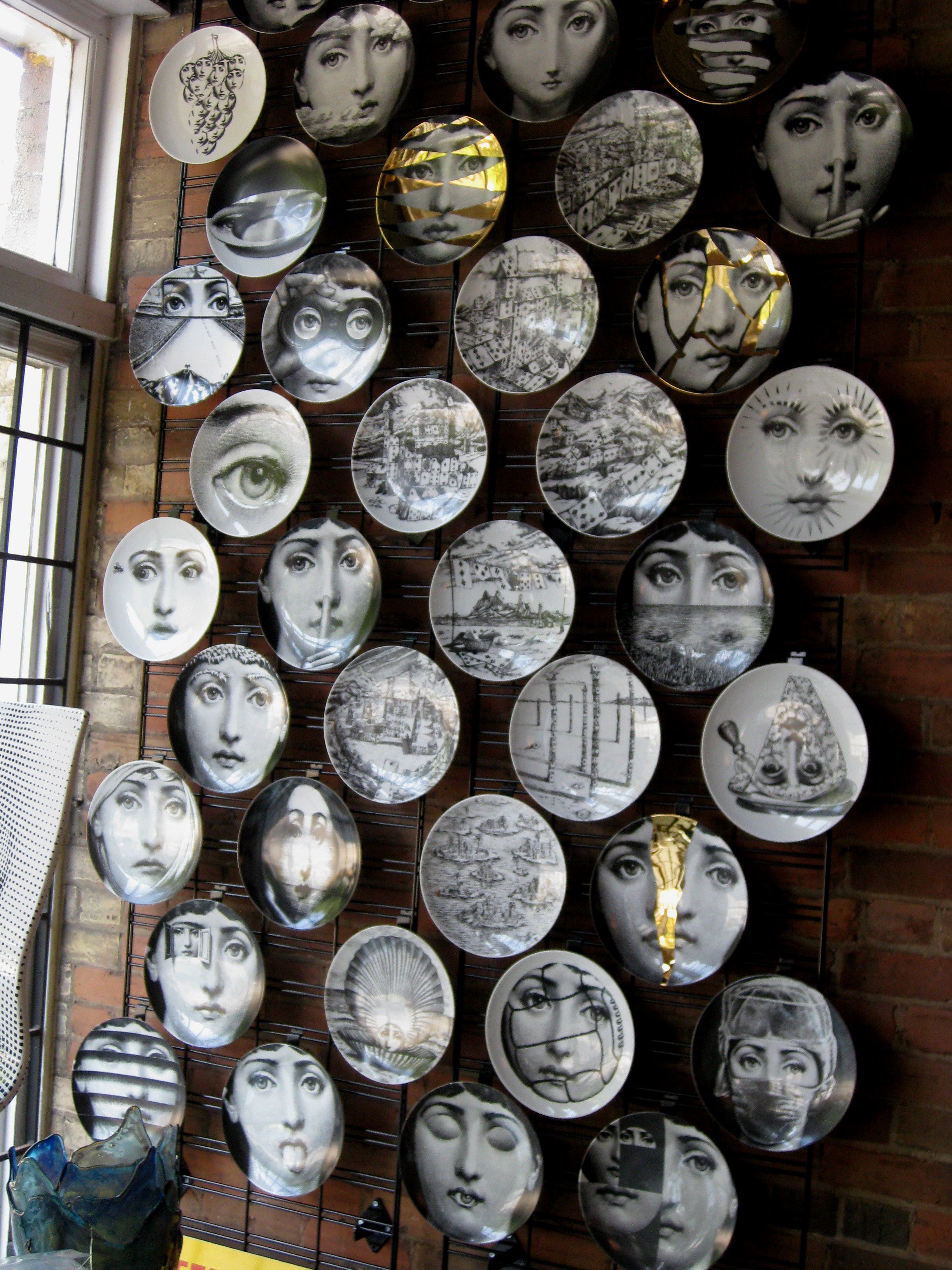 Gold Fornasetti plate Theme & Variations series no g122