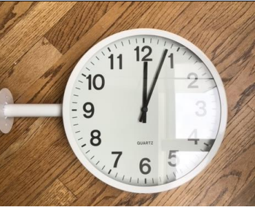 Double sided wall clock